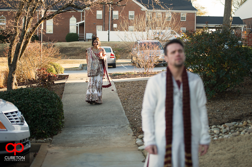 Groom awaiting his bride for a first look.