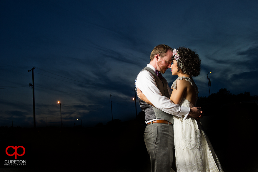 Couple at sunset after their Huguenot Loft Wedding in downtown Greenville,SC. 