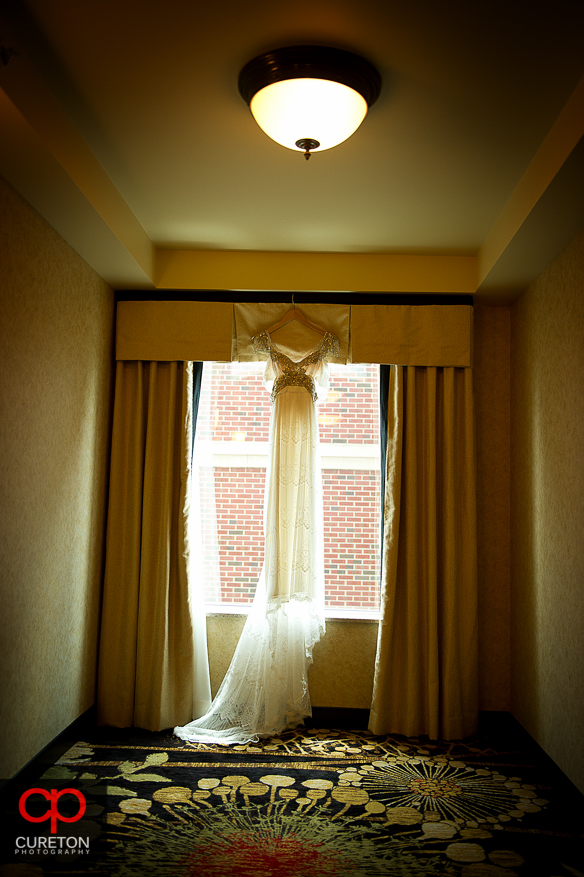 Bride's dress hanging in the Hampton Inn in downtown Greenville,SC.