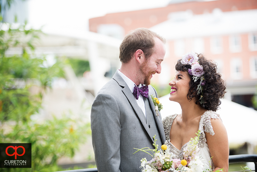 Bride and Groom looking at each other.