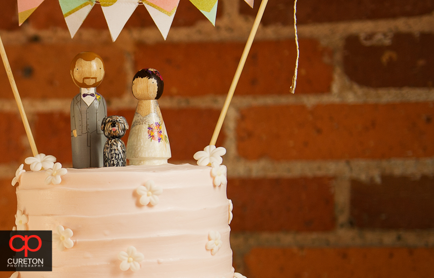 Cute custom wedding cake toppers.