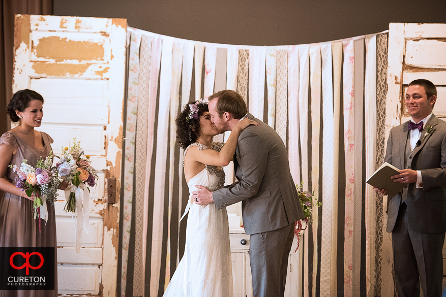 First kiss at the wedding ceremony.