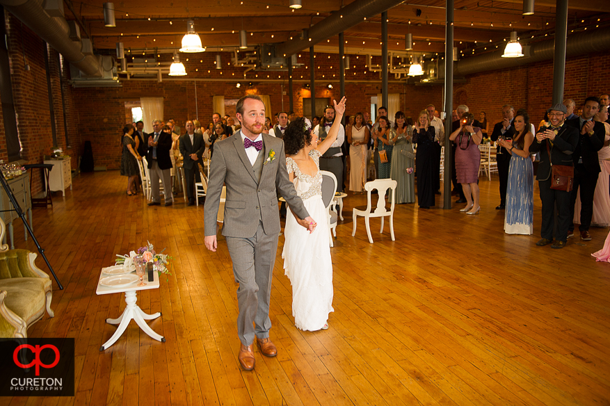 Couple being announced at the reception.