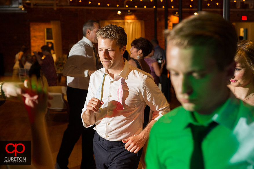 Guests dancing as Uptown Entertainment plays the wedding reception at Certus Loft.