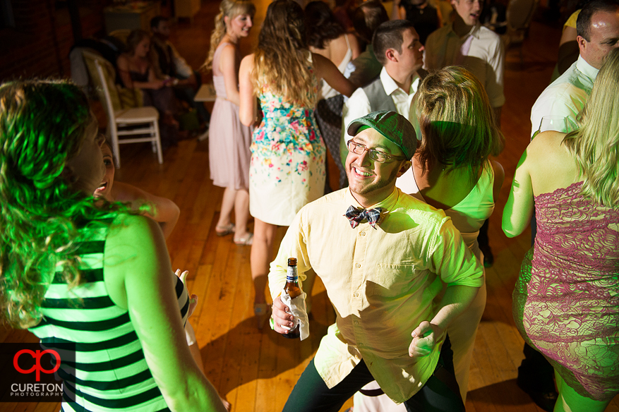 Guests dance at the Huguenot Loft wedding reception in downtown Greenville,SC.