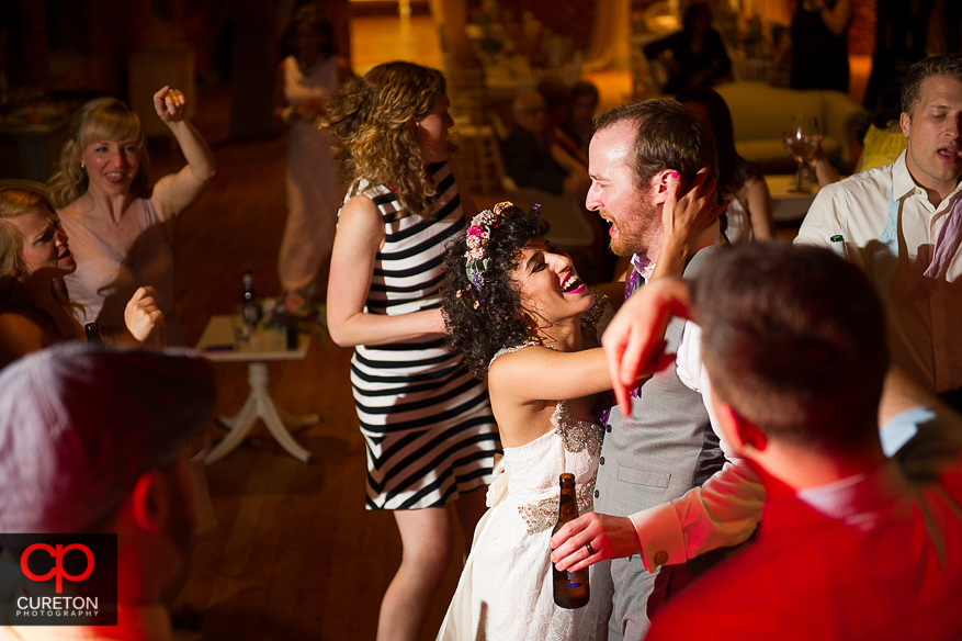 Guests dance at the Huguenot Loft wedding reception in downtown Greenville,SC.