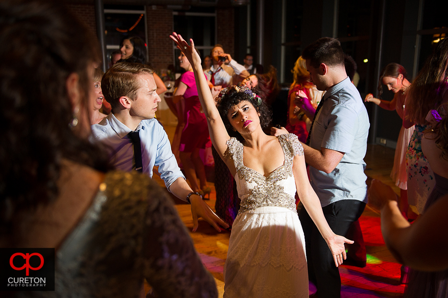 Guests dance at the Huguenot Loft wedding reception in downtown Greenville,SC.