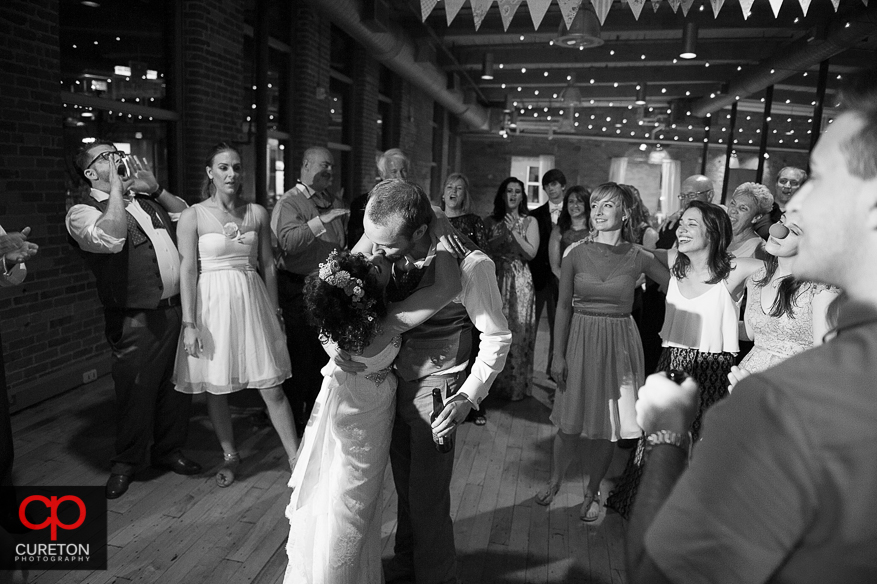 Guests dance at the Huguenot Loft wedding reception in downtown Greenville,SC.