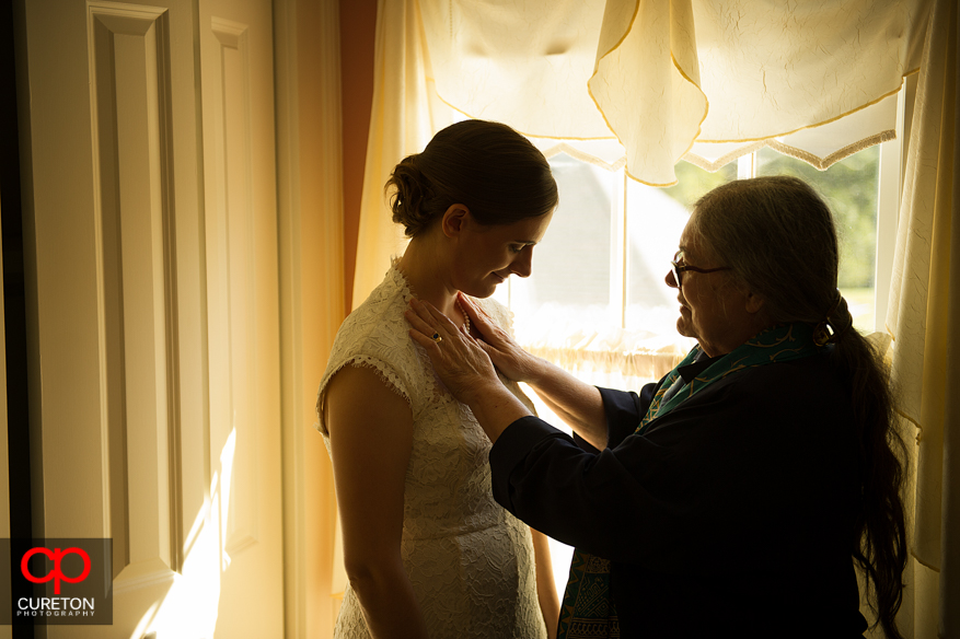Mom and bride before wedding at Lenora's Legacy.