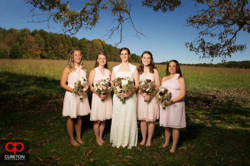 Bride and her bridesmaids before wedding.