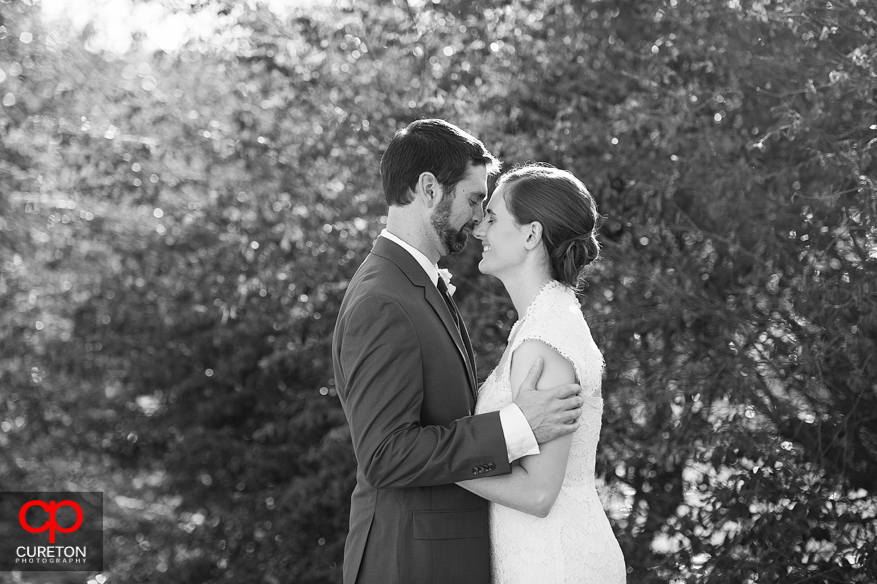 Black and white photo of bride and groom at Lenora's Legacy.