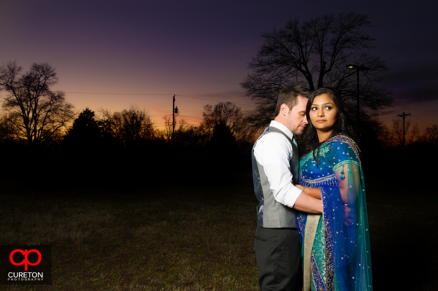 Couple at sunset before their reception at The Loom in Simpsonville,SC.