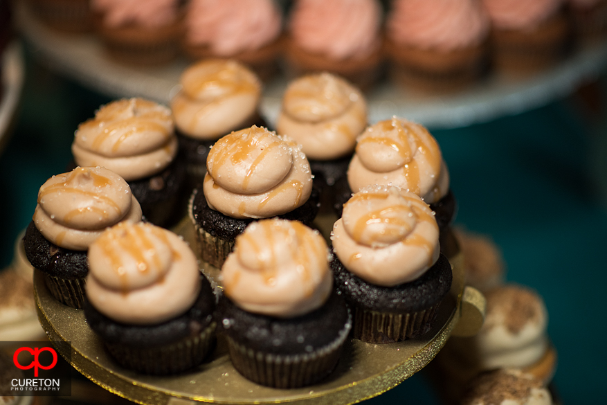 Closeup of wedding cupcakes.