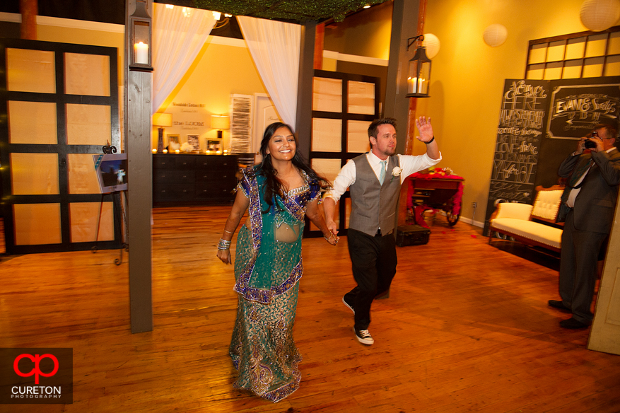 Bride and Groom making their entrance at the reception.