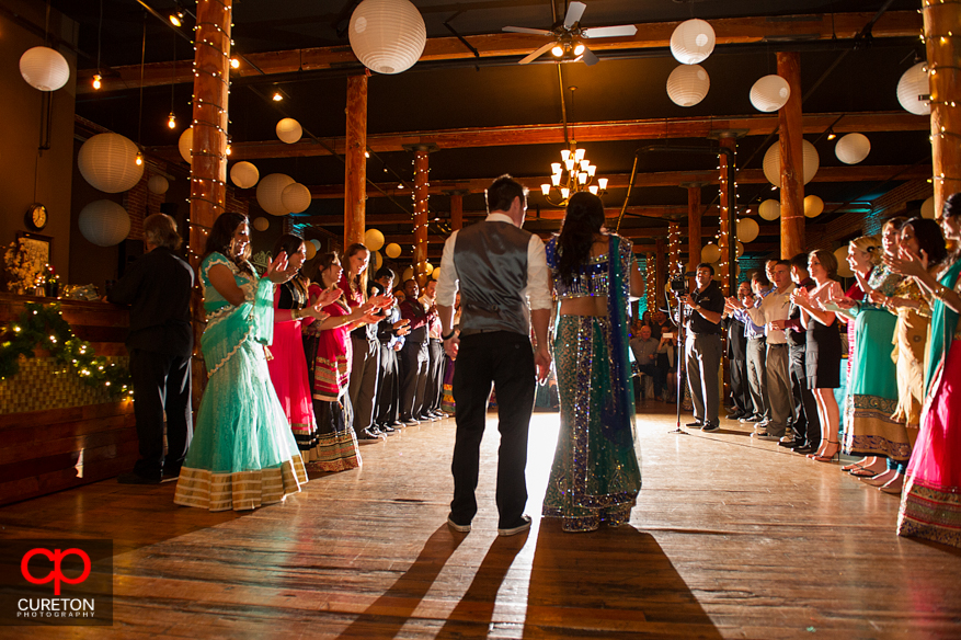 Bride and Groom make their entrance at their Indian wedding reception at The Loom in Simpsonville,SC.