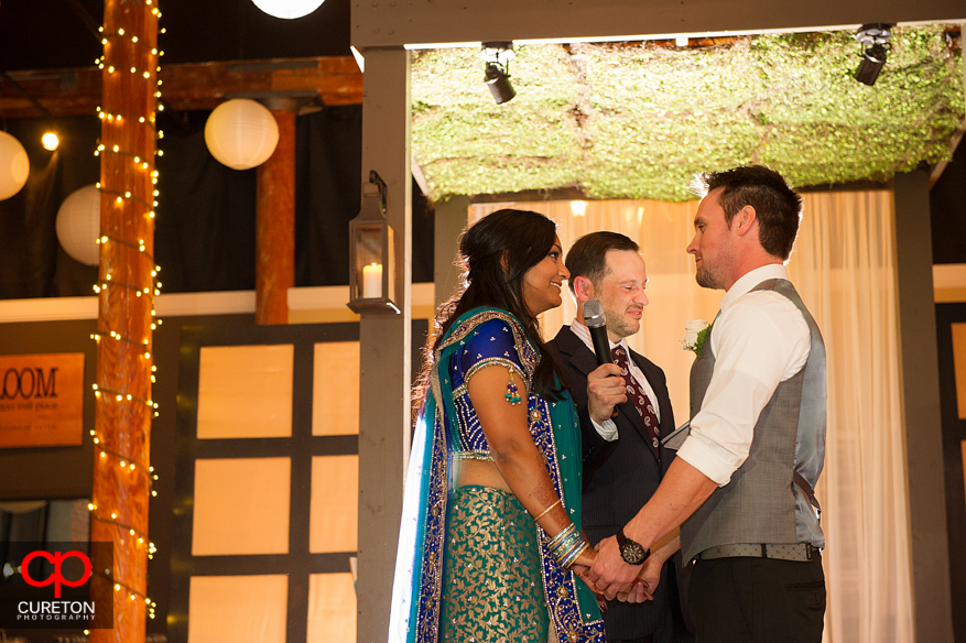 Bride and groom exchanging vows.