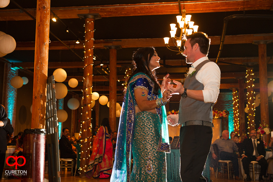 Bride and Groom dancing a first dance at the Lom.