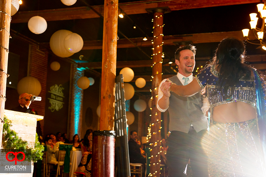 Groom smiles during the first dance.