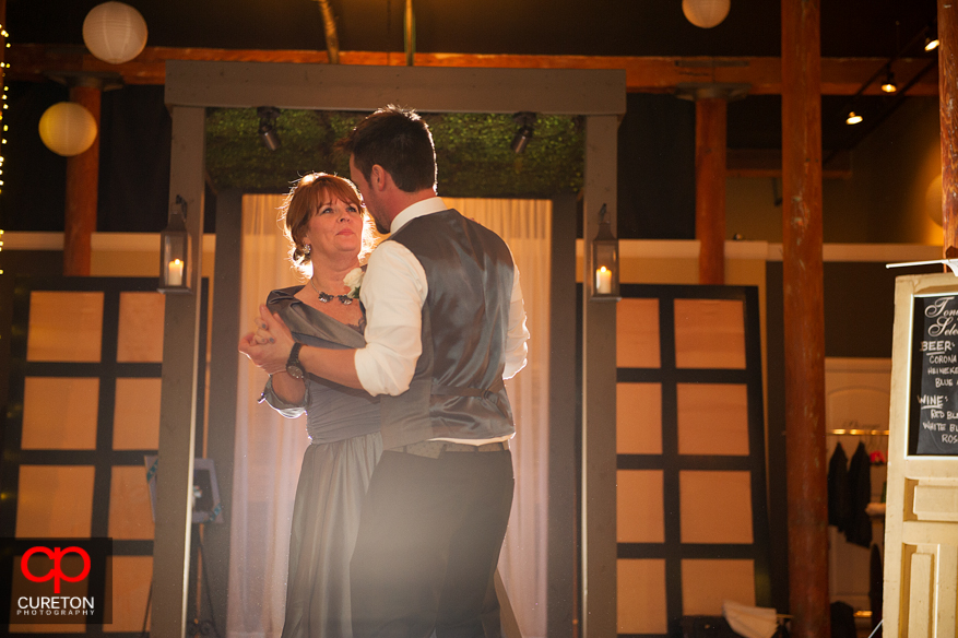 Groom and mother dancing at the reception.