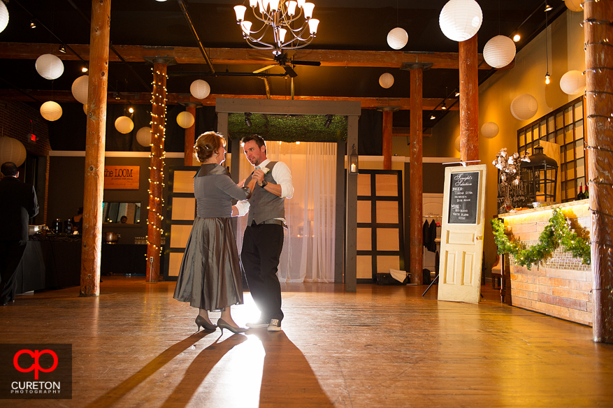 Groom and mother dancing at The Loom.