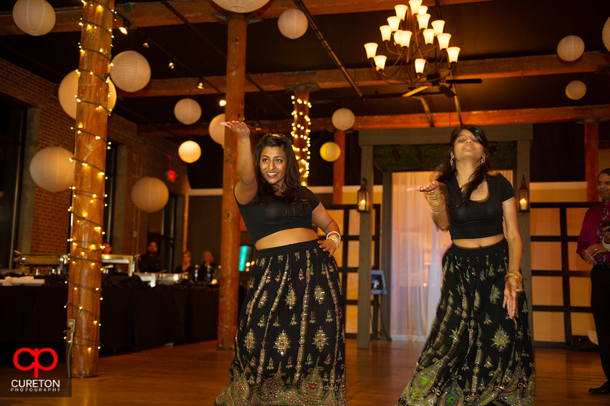 Bride's sister dances and performs for her at her Indian wedding reception at The Loom.