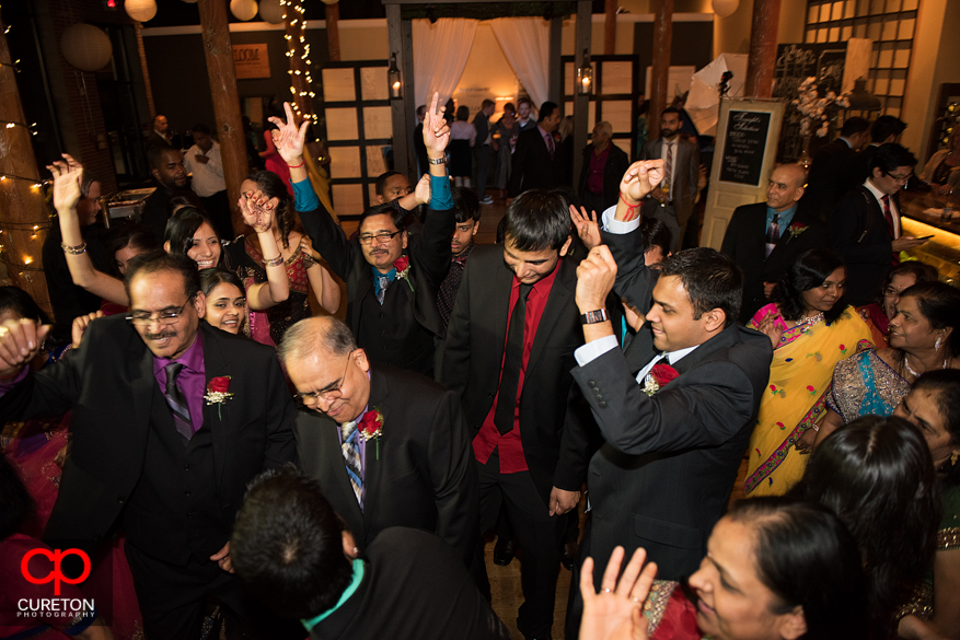 Guests and family dancing the night away at the Loom in Simpsonville.