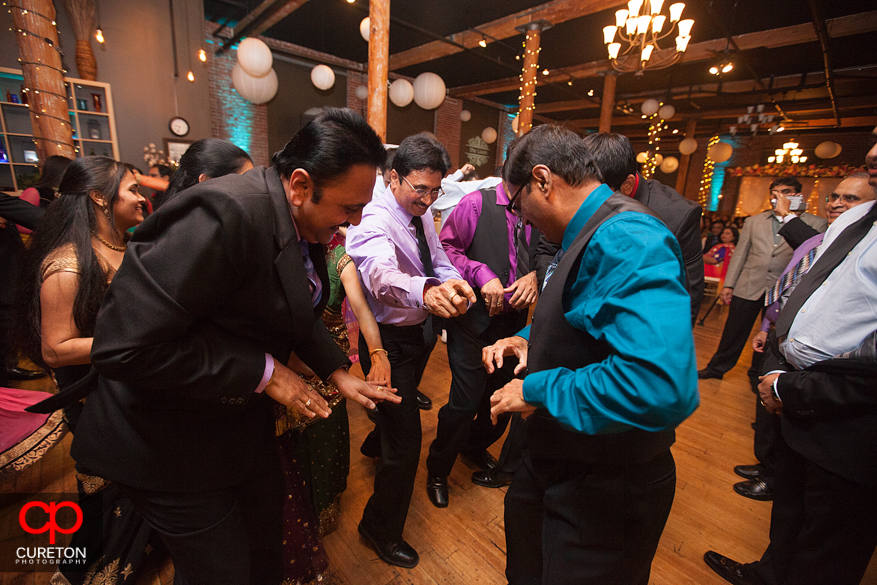 Bride's father dancing at the reception.