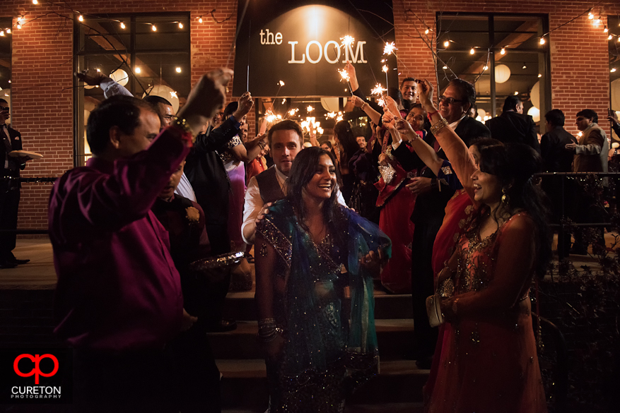 Bride an Groom during a sparkler leave at The Loom in Simpsonville after their Indian wedding reception.