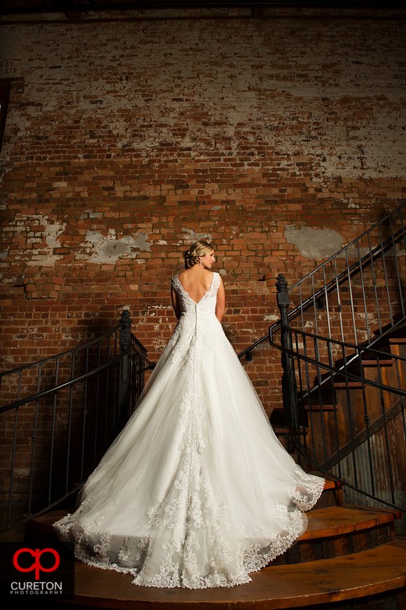 Beautiful Bride standing on the staircase at OCW.