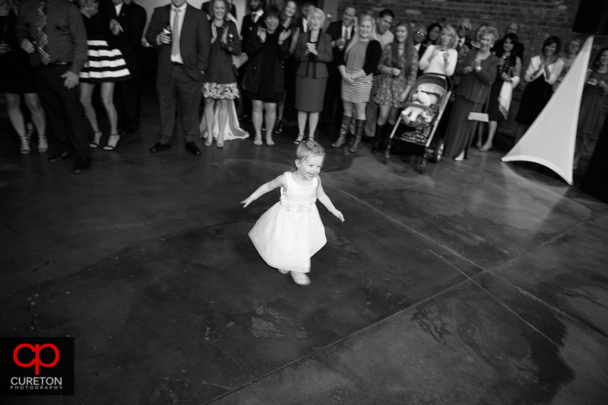 Child dancing at the reception.