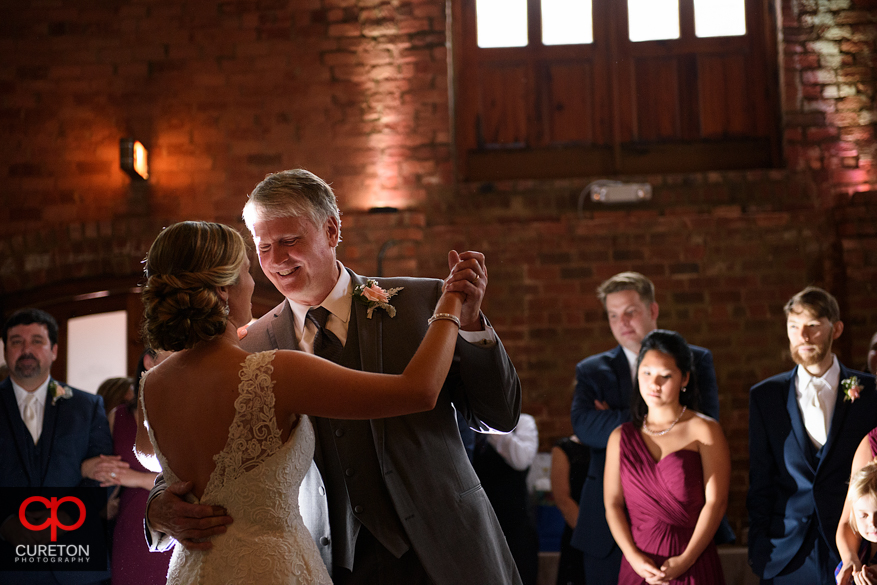 Bride dancing with her father.