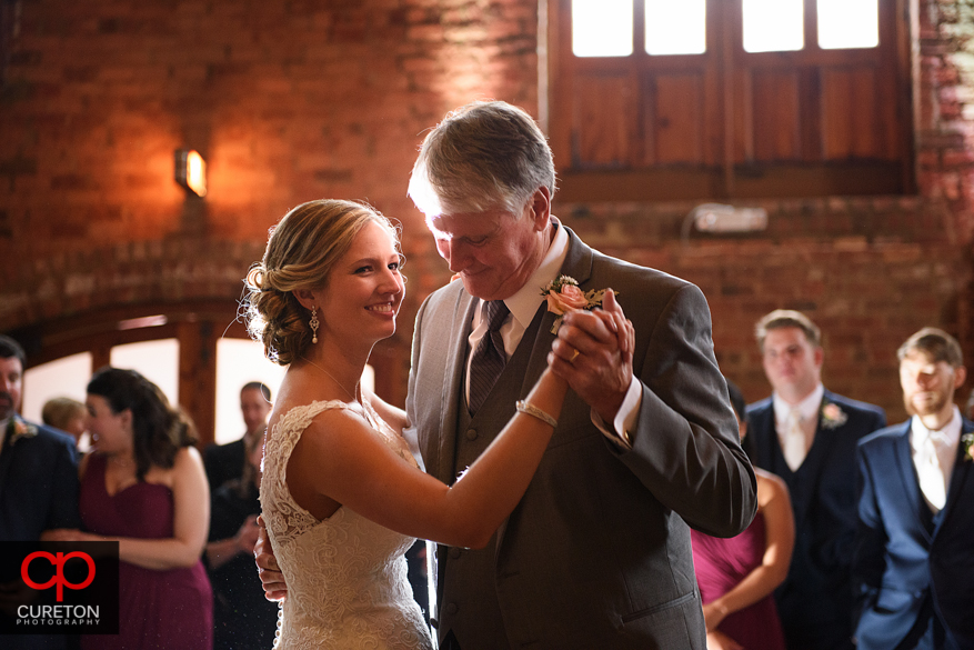 Bride dancing with her father.