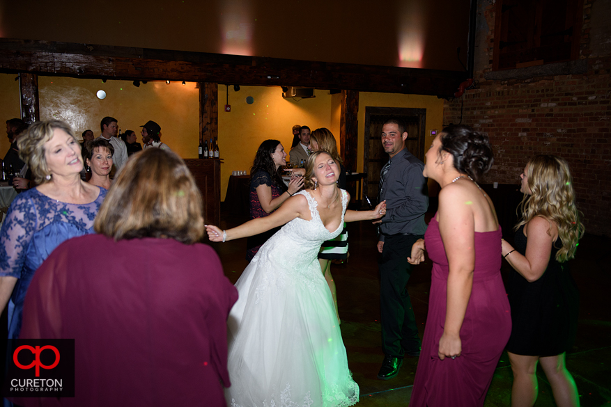 Wedding guests dancing the Old Cigar Warehouse.