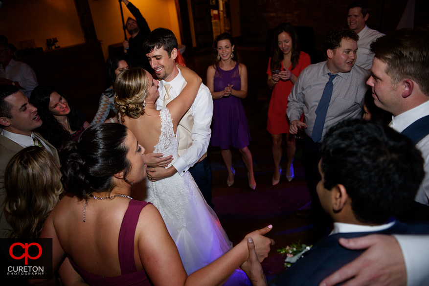 Wedding guests dancing the Old Cigar Warehouse.