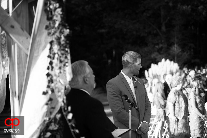 Groom sees his bride for the first time.