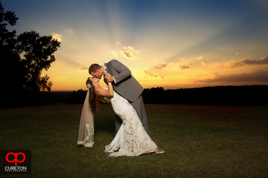 A bride and groom at sunset after their San Souci Farms wedding in Sumter,SC.