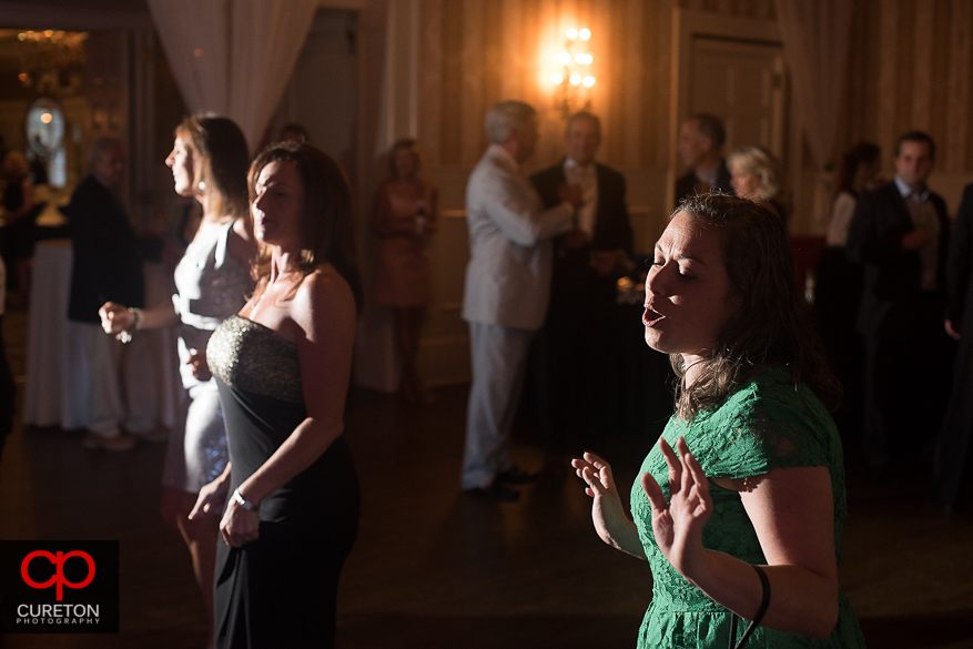 Guest having a good time at the reception at the Spartanburg Country Club.