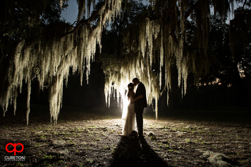 A shot of a bride and groom at San Souci Farms by Sumter Wedding Photographers Cureton Photography.