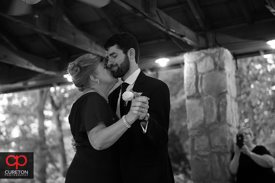 The groom dancing with his mother.