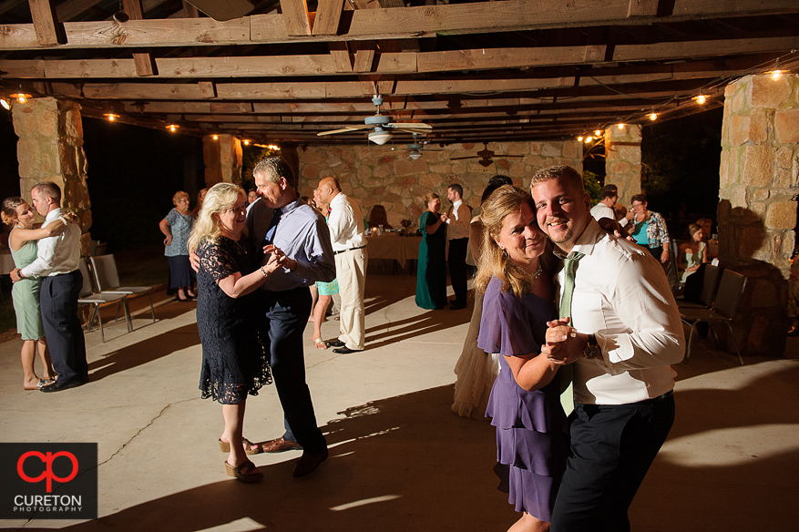 Guest having fun dancing at the Timberock at Hopkins Farm wedding reception.