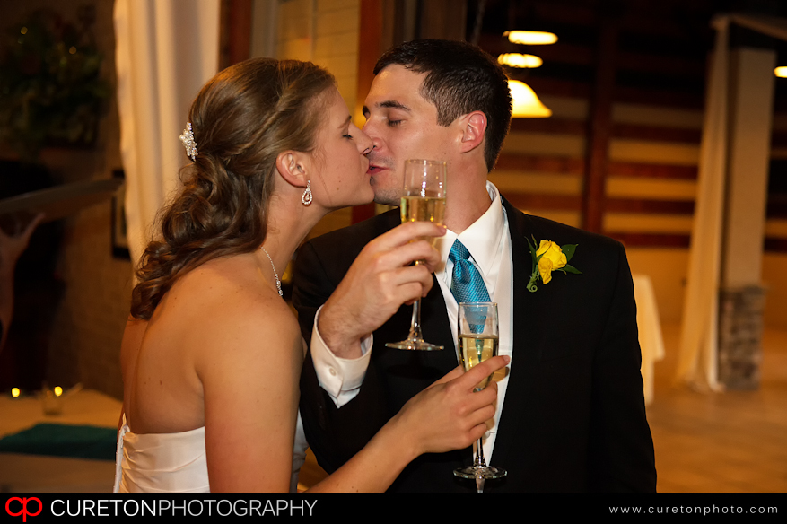 Bride and Groom toasting.
