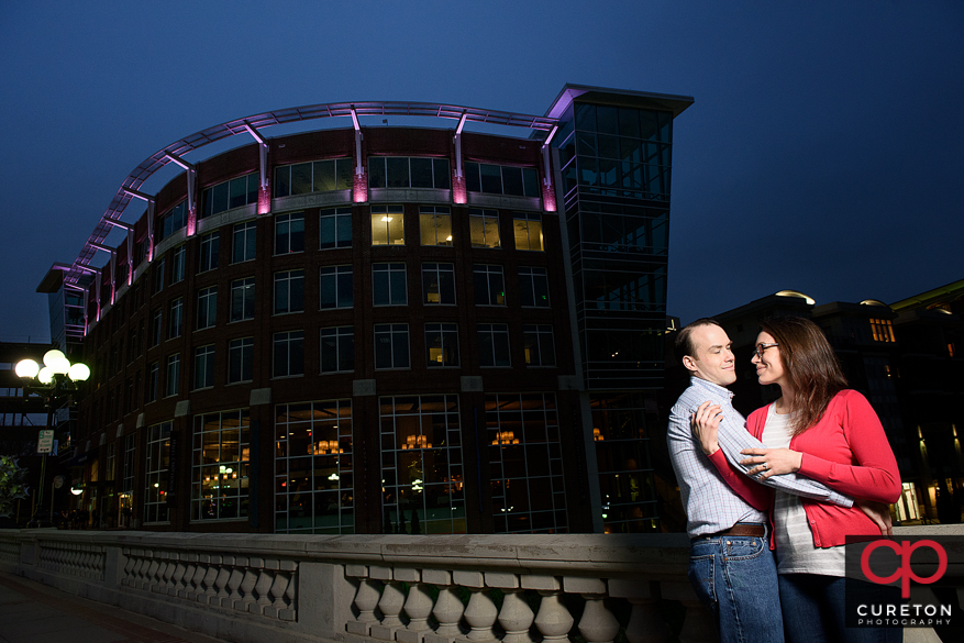 Creative nighttime engagement photo in downtown Greenville,SC.