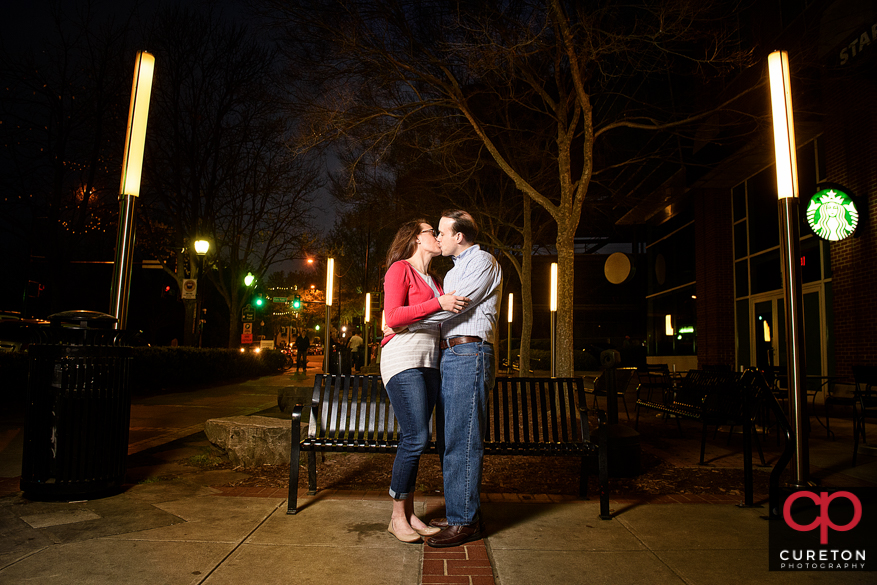 Epic nighttime engagement photo in downtown Greenville,SC.