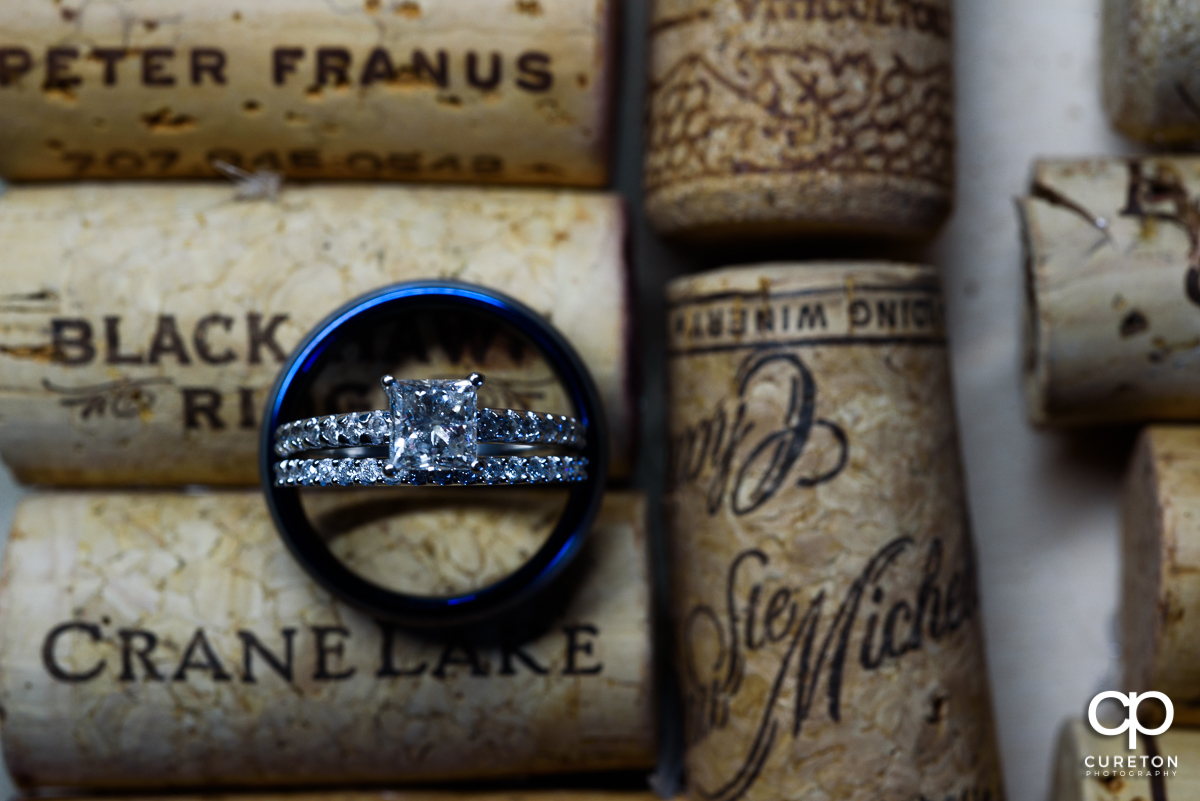 Wedding ring closeup on a group of wine corks.