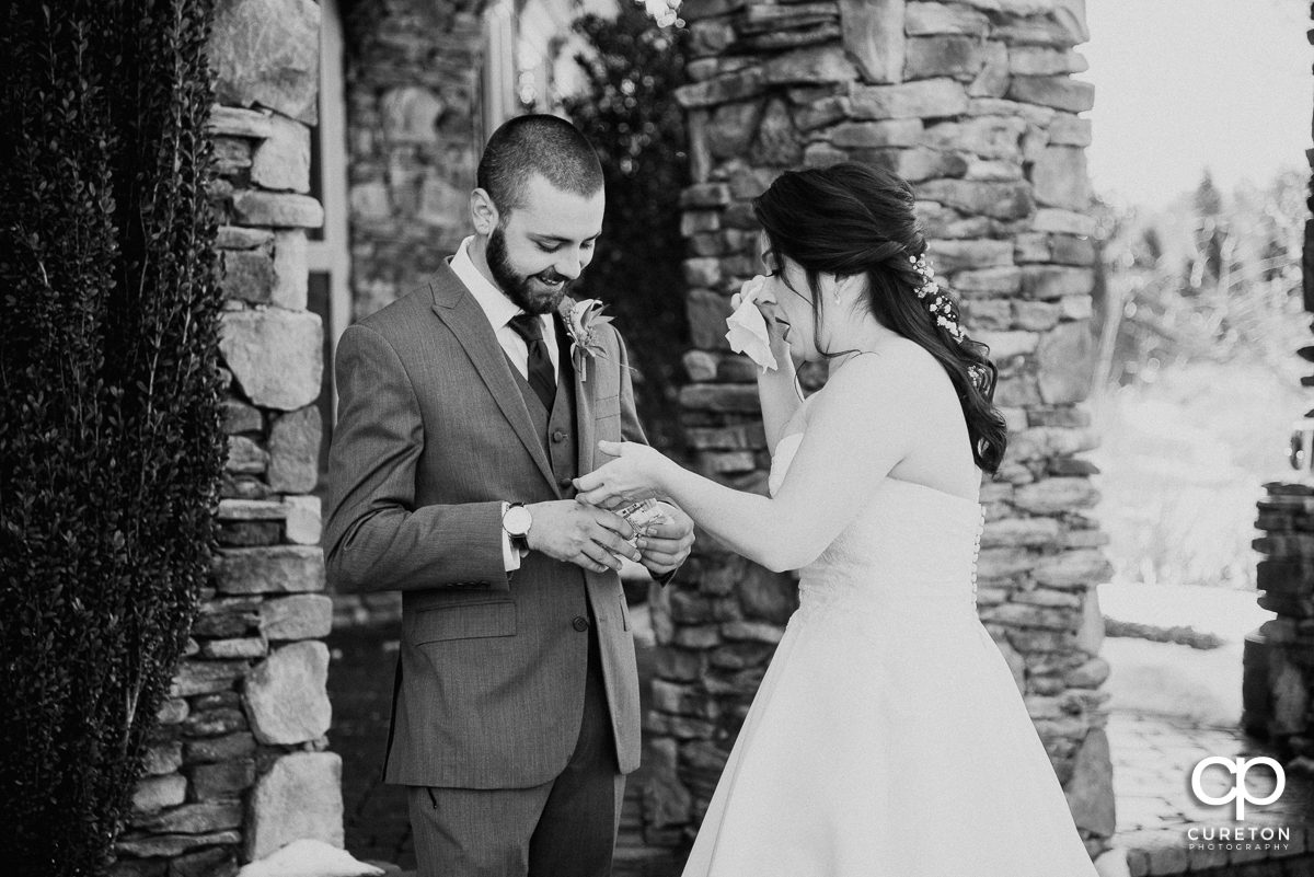 Bride and groom sharing a tissue after their first look before their Cleveland,NC wedding.