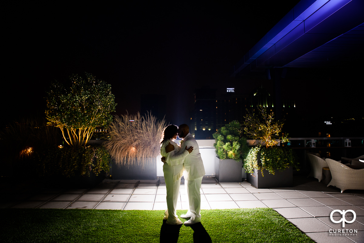 Bride and groom on the rooftop after their wedding at Avenue in downtown Greenville,SC.
