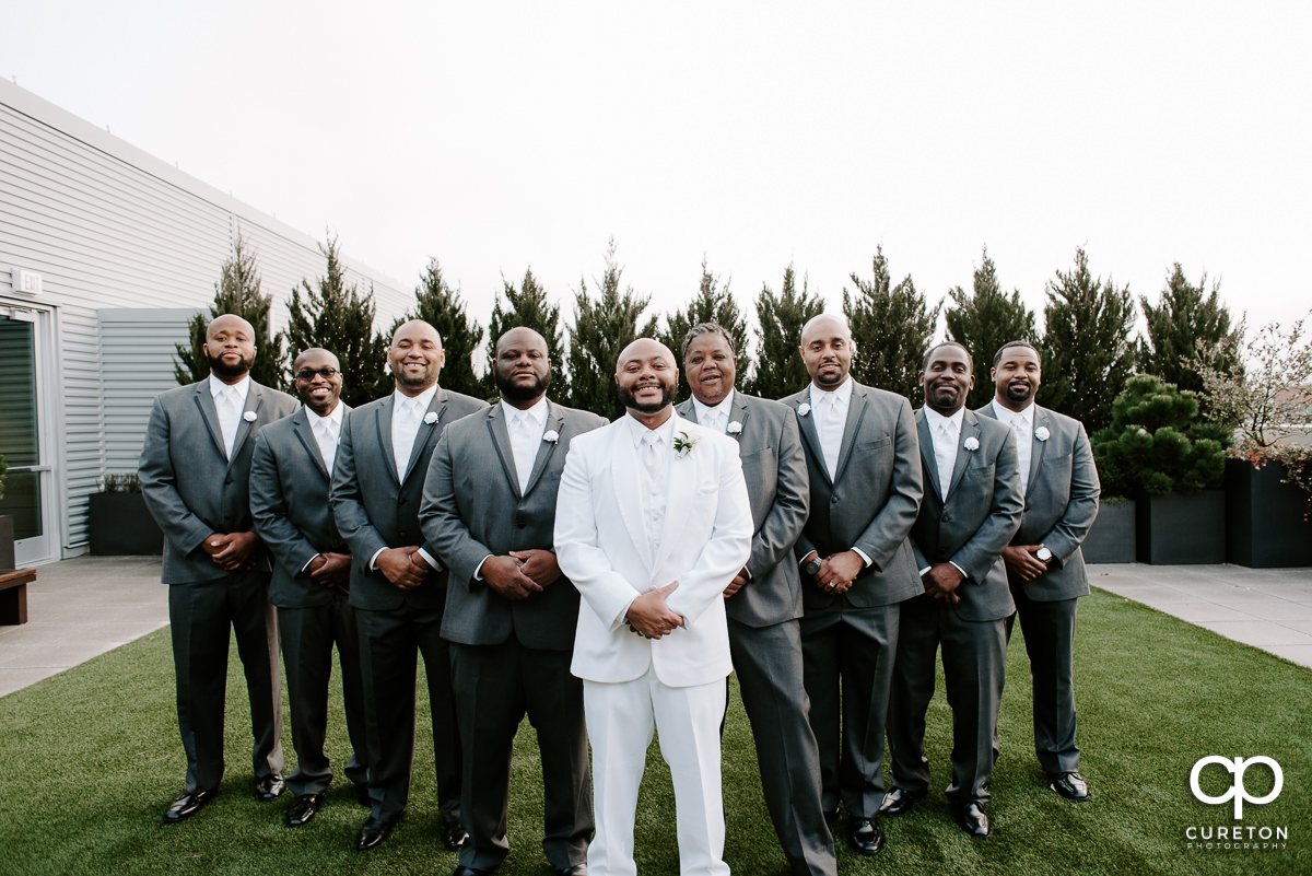 Groom and groomsmen before the wedding reception at Avenue Greenville.