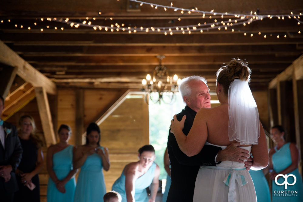 Bride and father dance at their wedding reception at The Barn at Forevermore Farms.