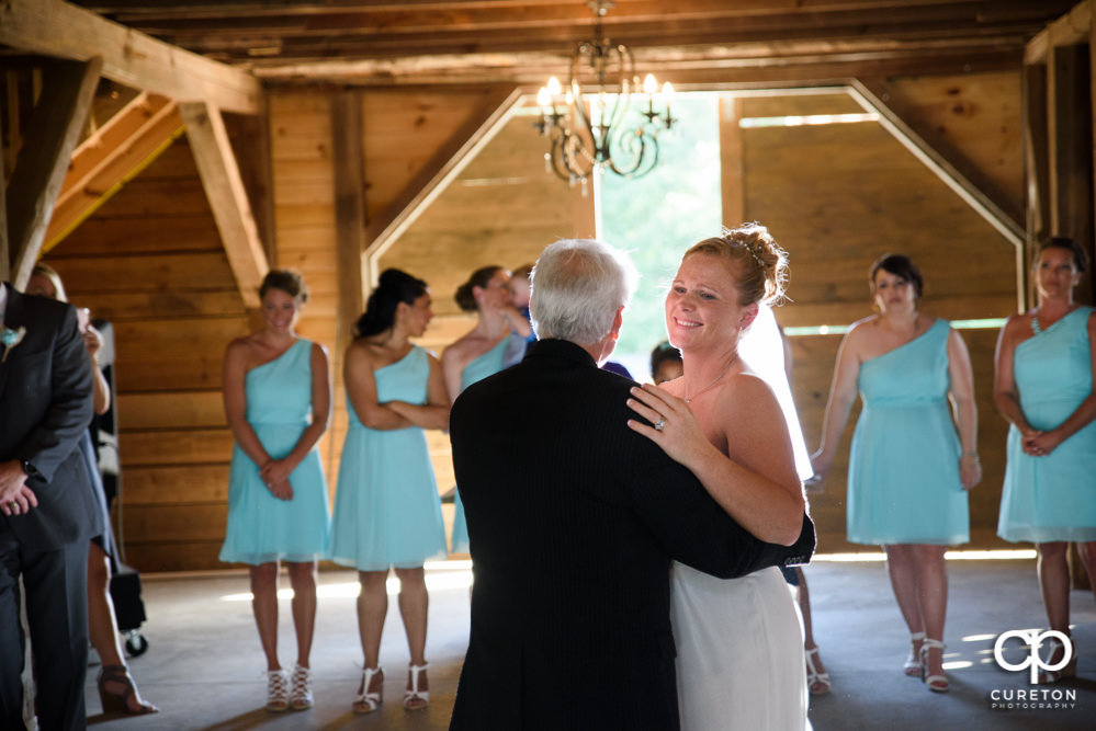 Bride and father dance at their wedding reception at The Barn at Forevermore Farms.