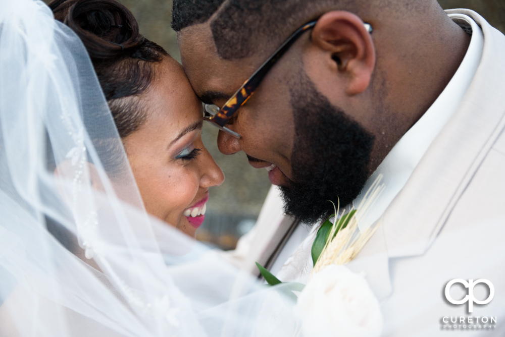 Closeup of a bride and groom.